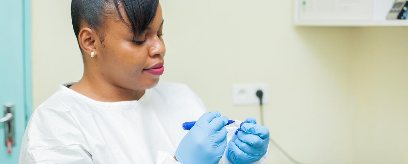 Fortunate Maluwa – Laboratory technician MSF, labeling HPV samples.